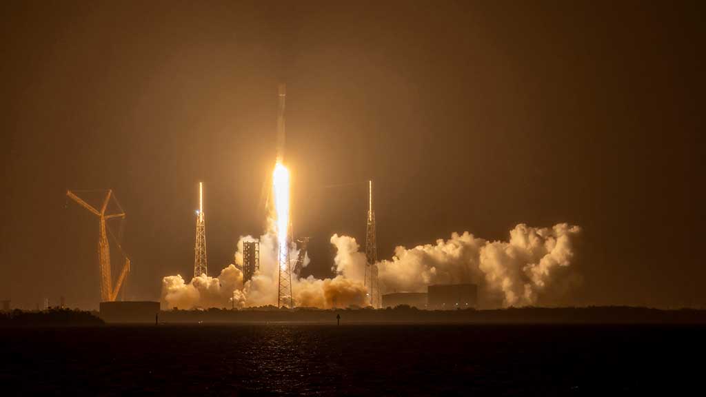 SpaceX Rocket Launching from lauch pad in night