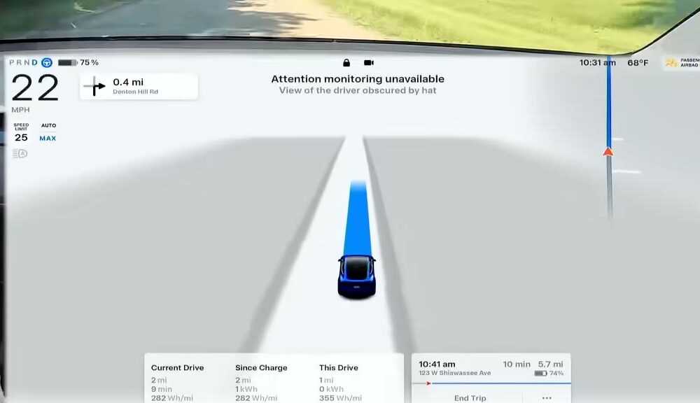 Tesla Full Self Driving (FSD) showing driver attention system warning