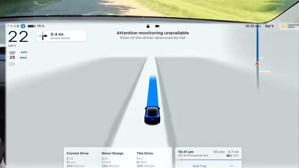 Tesla Full Self Driving (FSD) showing driver attention system warning