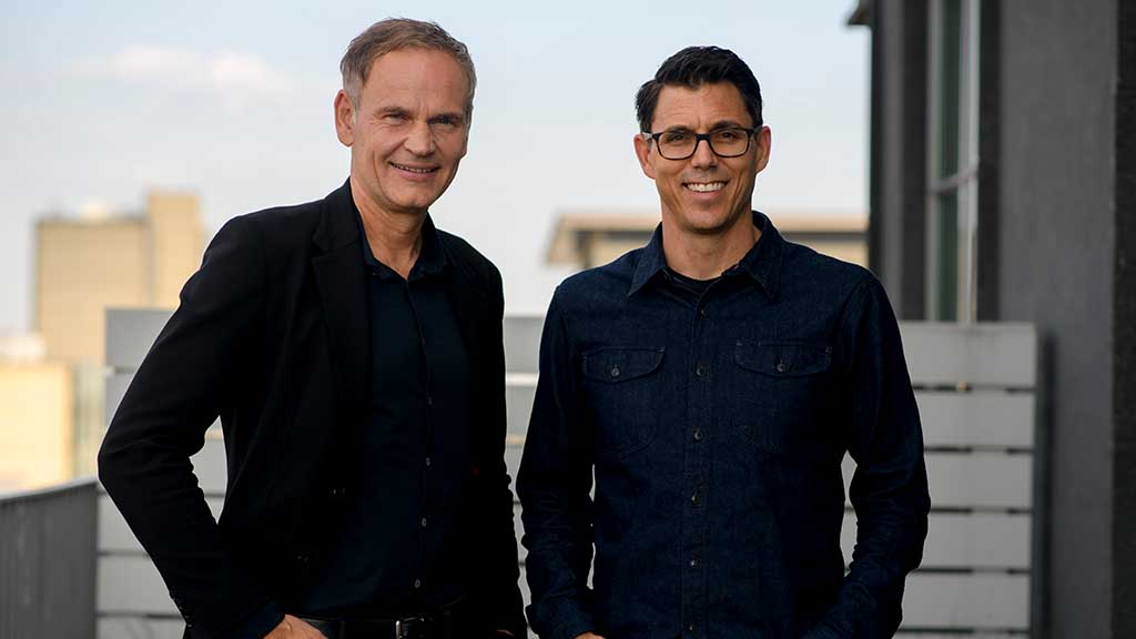 Volkswagen Group CEO, Oliver Blume (left) and RJ Scaringe Founder and CEO of Rivian (right)