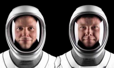 NASA astronaut Nick Hague (left) and Roscosmos cosmonaut Aleksandr Gorbunov pose for portraits in their flight suits at SpaceX headquarters in Hawthorne, California