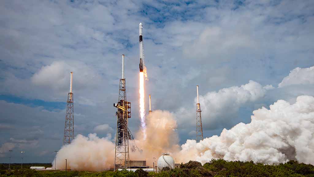 SpaceX Falcon 9 rocket lifting off from Space Launch Complex 40 at Cape Canaveral Space Force Station in Florida with Crew-9 mission