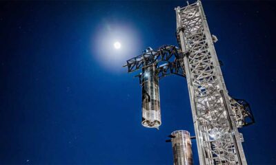 SpaceX Starbase launch tower stacking Starship on top of the Super Heavy Booster