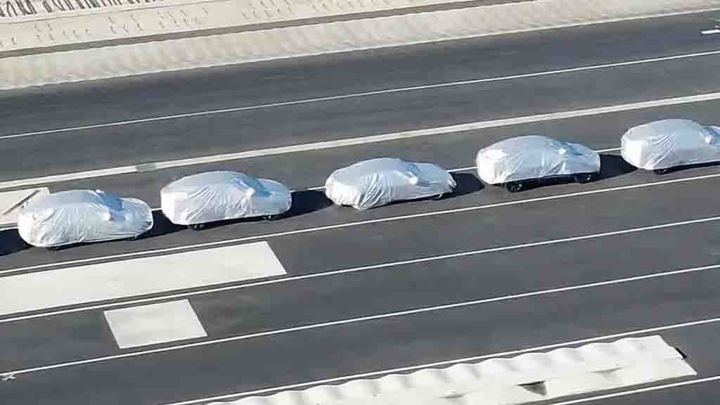 Several Covered Tesla at Fremont Factory