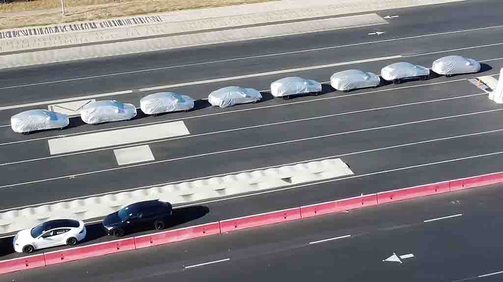 Several Covered Tesla at Fremont Factory